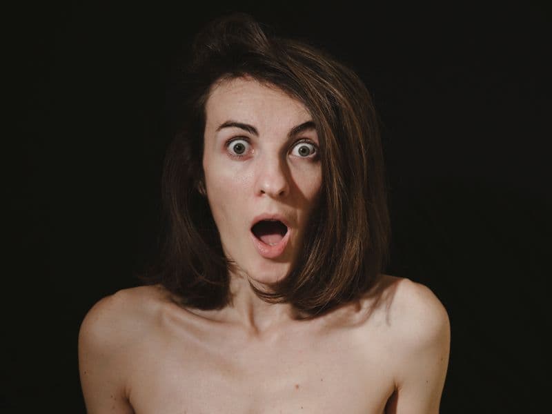 Close-up of a surprised face on a black background, used as an alternate thumbnail crop. Photo by Engin Akyurt on Pexels